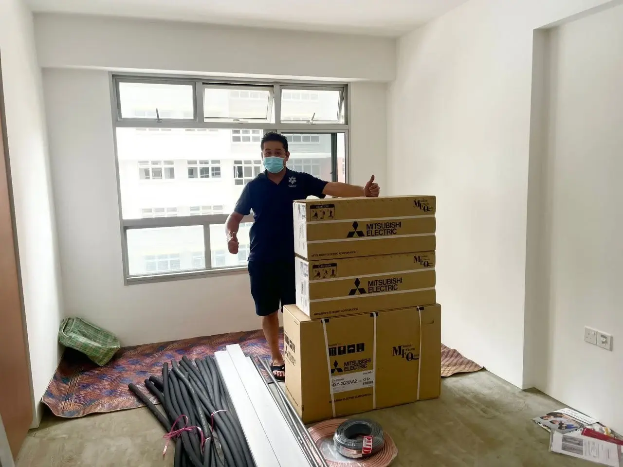 Installer preparing equipment and materials before installation work begins.